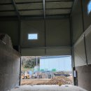 신안냉난방 | 신안군 수산물 시설 대형 오버헤드도어 시공 후기 (7m x 4m 버티컬 리프트)