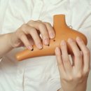 오카리나 반음운지법 中 절반음운지법 (손모양 사진) 이미지