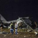 현금을 수송하던 볼리비아의 C-130이 추락해 버스와 충돌 이미지
