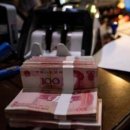 중국 본토 지방정부는 첫 5개월 동안 2조 8천억 위안의 채권을 발행했는데, 그 중 거의 절반이 오래된 부채를 상환하는 데 사용되었습니 이미지