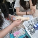 손끝에서 피어나는 네일아트 이미지