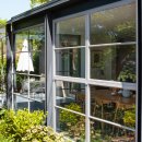 Cox Architecture adds steel and glass conservatory to 1920s house in Canberra 이미지