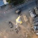 드론 띄워 원격 감시타워·통신부터 부쉈다...하마스 국경 침투 순간 이미지