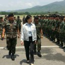 태국 총리 잉락 친나왓 : 사상 최초의 여성 국방부장관? 이미지