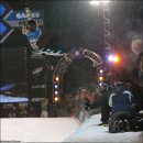 Hannah Teter, last year's winner and most talked about pipe rider of the season, pulls down this lein air in her fourth-place qualifying performance. 이미지