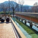 Modern Korean copper-roof-tile wall with cascades 이미지