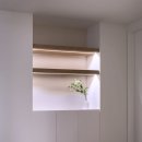 디자인홈파베르(주) | 산본 래미안하이어스 43평 ｜월넛 포인트로 고급 무드 완성한｜군포 인테리어｜홈파베르