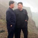 북한 기자들도 지쳤나… 北노동신문, 2·3면 같은 사진 배치 실수 이미지