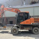 태권탑 | DX140W 두산 굴삭기와 함께 수출된 로보트 태권 V