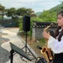 색소폰 연주 이미지