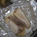 돼지난로 오븐기에서 구운 맛난 생선요리 이미지