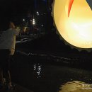 동전던지기 조형물 이미지