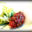 Tuna tartare and avocado tartare with yuzu foam and frisee. 이미지